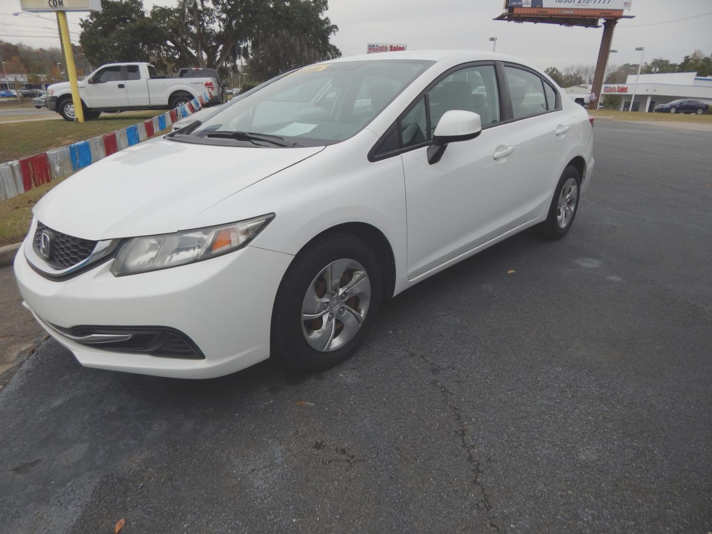 2013 White /Tan Honda Civic LX (19XFB2F57DE) with an 1.8L -4 cyl. engine, Automatic transmission, located at 3120 W Tennessee St, Tallahassee, FL, 32304-1002, (850) 575-6702, 30.458841, -84.349648 - Used Car Supermarket is proud to present you with this loaded immaculate 2013 Honda Civic LX sedan with low miles. Used Car Supermarket prides itself in offering you the finest pre-owned vehicle in Tallahassee. Used Car Supermarket has been locally family owned and operated for over 48 years. Our Ci - Photo#0